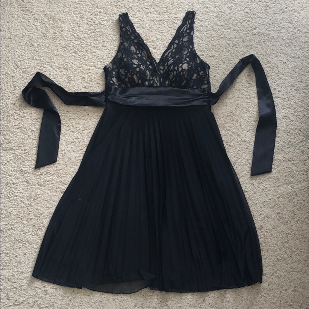 Black lace, chiffon, and satin dress by Studio Y.